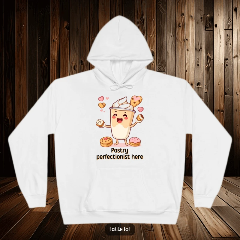 Funny hoodie featuring a latte cup character happily juggling assorted pastries, perfect for cozy days.