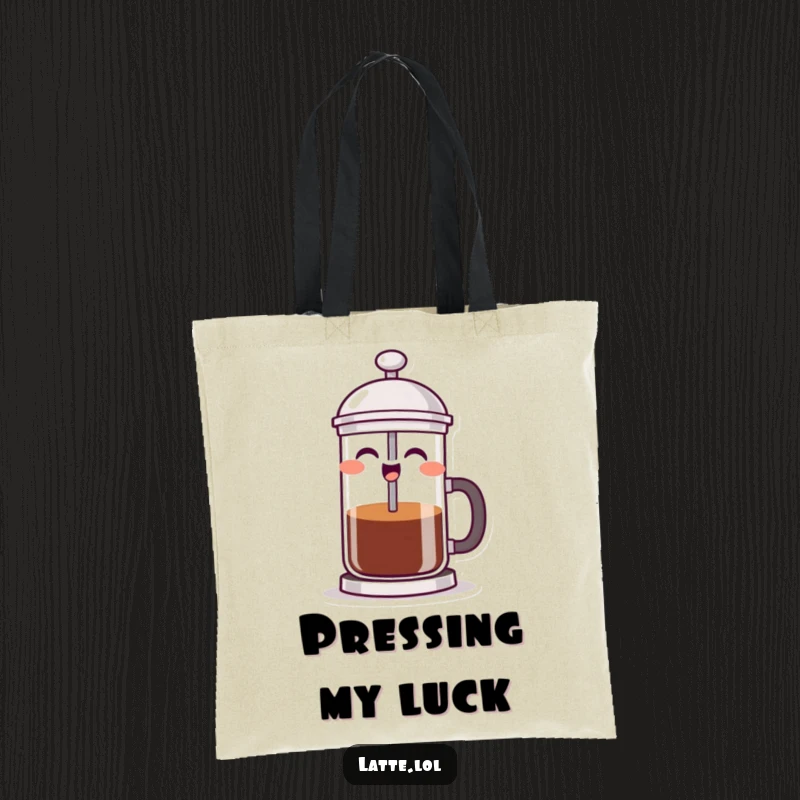 Funny French press tote bag depicting a laughing coffee maker character ready to plunge, ideal for carrying groceries with glee.